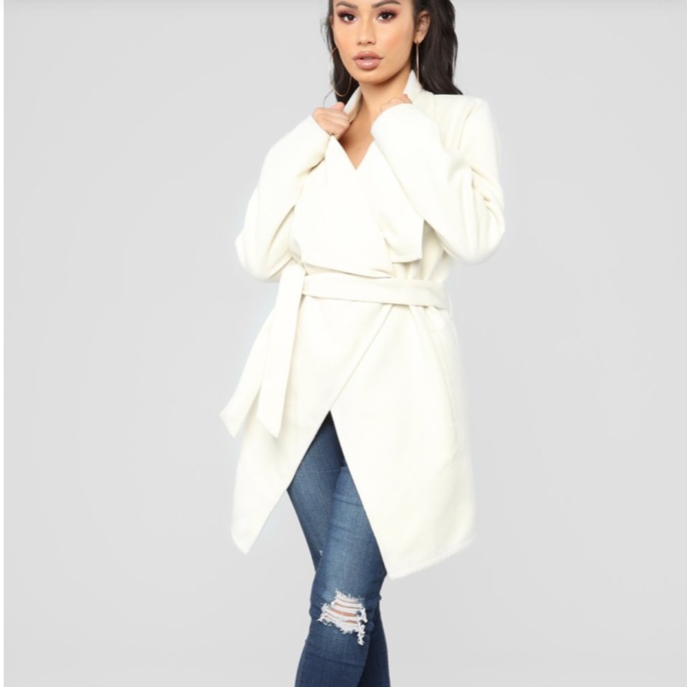 Brand new Ivory wrap coat. Never worn.